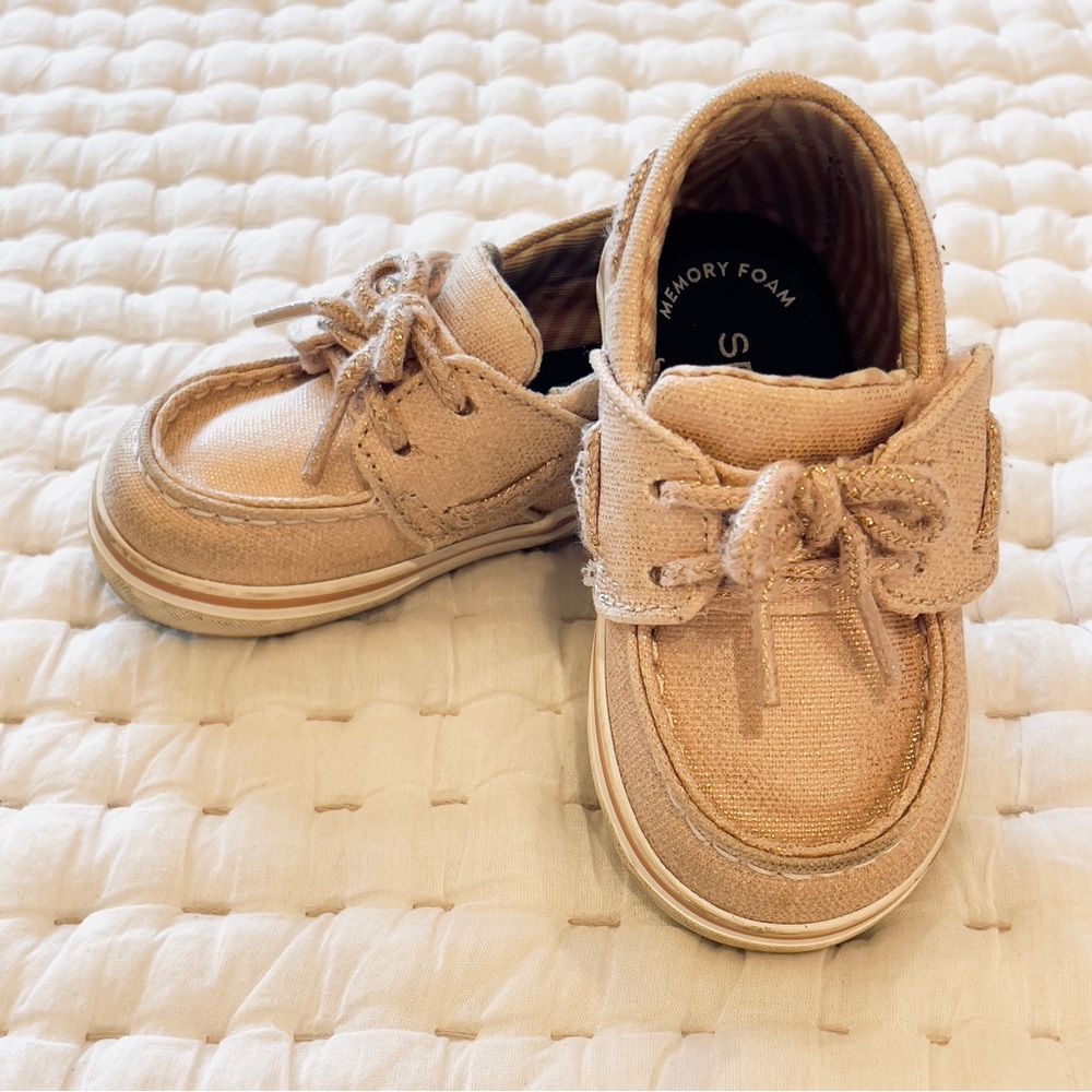 Pink sperrys with gold flecks for toddler girl. Play condition.